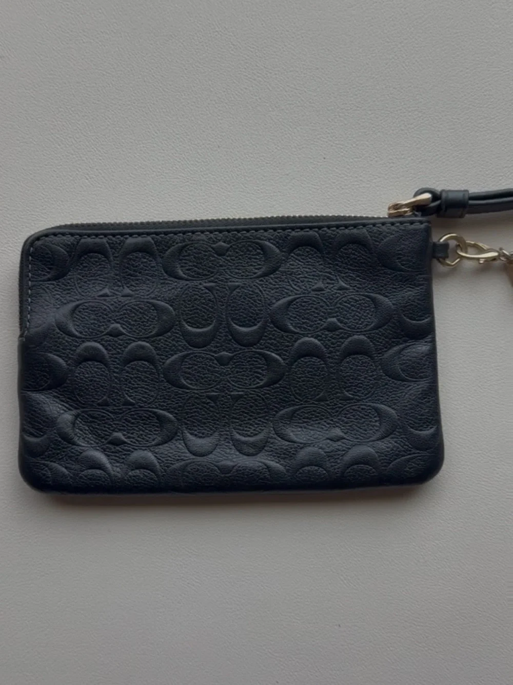 Coach Black Embossed Signature Wristlet with Gold Logo